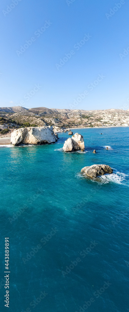 The coast of Cyprus, near the city of Paphos. Top view of the sea, mountains and the beach.