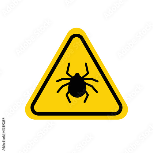 Tick warning sign. Yellow triangle with black mite silhouette in line frame. Vector isolated on white. photo