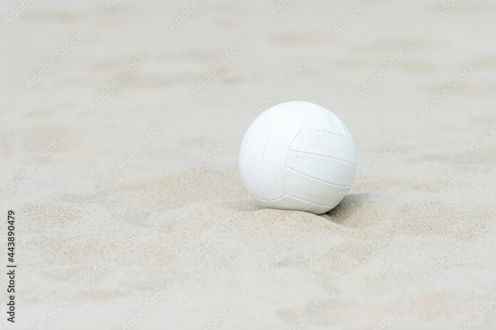 Beach volleyball ball on the sand beach. Team sport concept Beach volleyball ball on the sand beach. Team sport concept