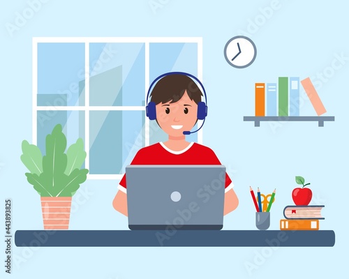 Pupil with laptop studying online at home in room
