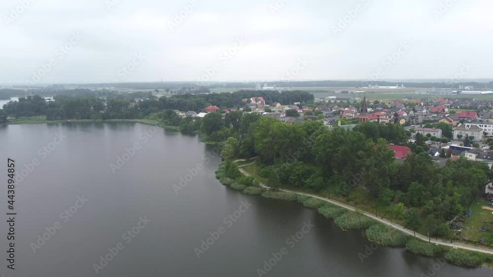 Flight over the lake and view of the city. Flight over the lake and view of the city.