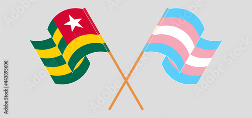 Crossed and waving flags of Togo and Transgender Pride