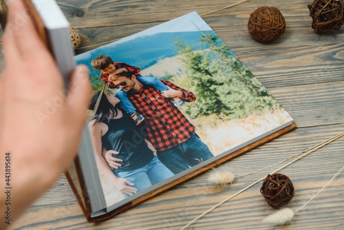 Photography Luxury wooden photo book on natural background
