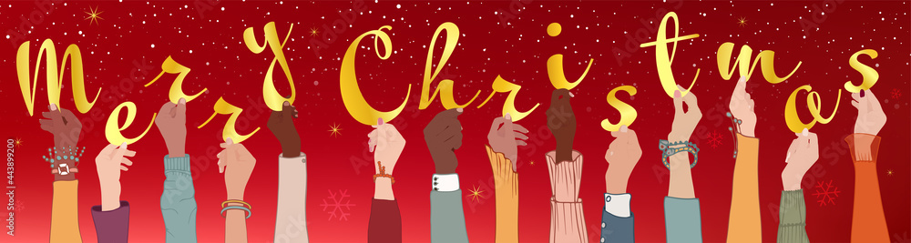 Raised arms of colleagues and co-workers diverse and multi-ethnic people holding letters forming the text -Merry Christmas- Banner happy Christmas holidays wishes.
