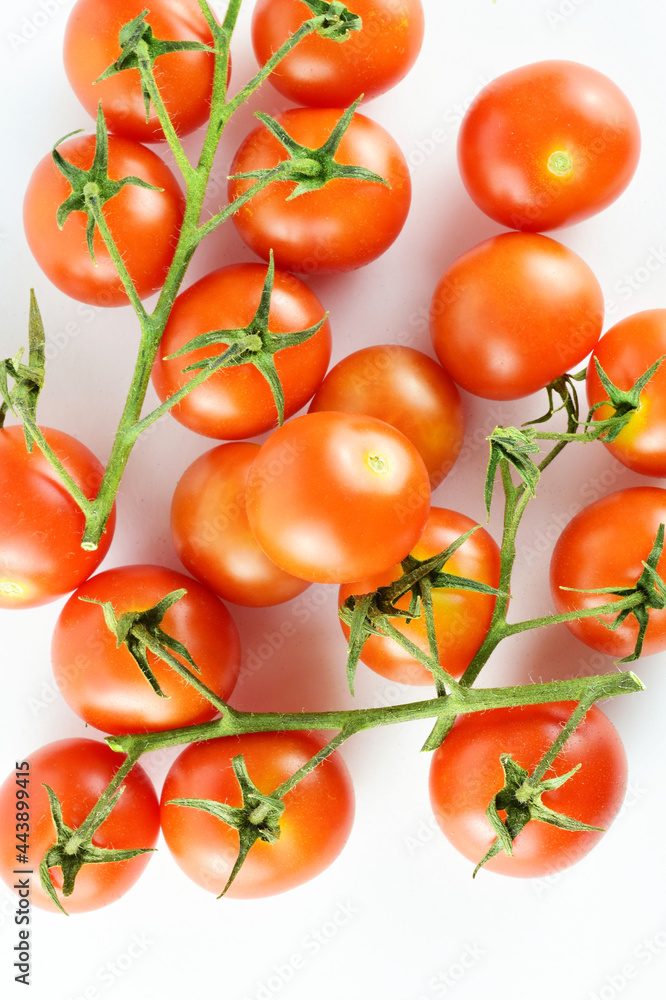 Top view shot, vine cherry tomatoes on a light background Top view shot, vine cherry tomatoes on a light background