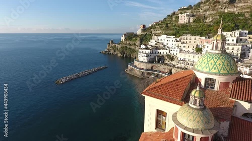 Aerial drone footage view of The Amalfi Coast is the stretch of coast bell, south of the Sorrento Peninsula, overlooking the Gulf of Salerno, Italy in the Mediterranean Sea // no video editing
 photo