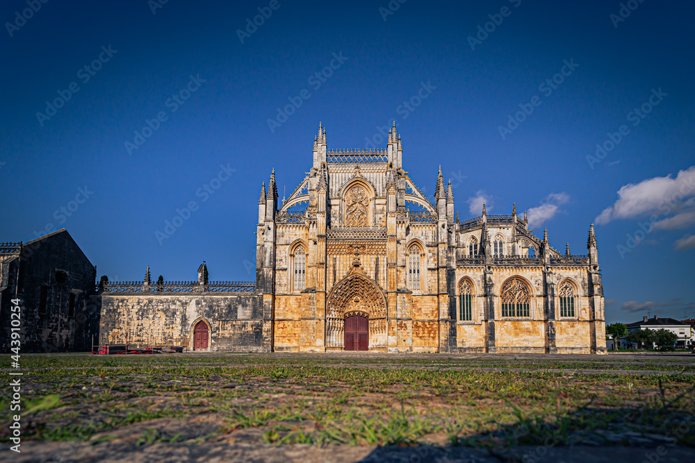 Fototapeta premium Batalha - June 22, 2021: The Majestic Batalha Monastery, Portugal
