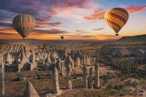 Balloons flying over cappadocia.