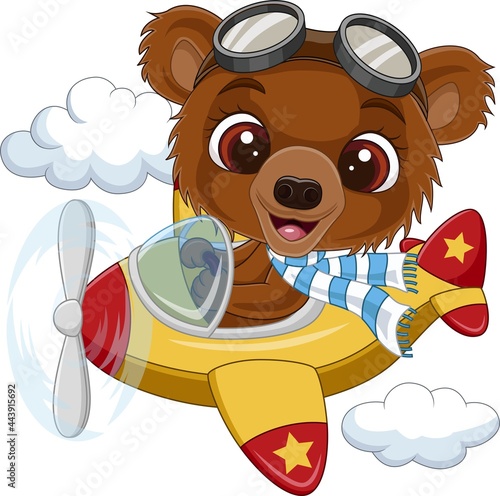 Cartoon baby bear operating a plane