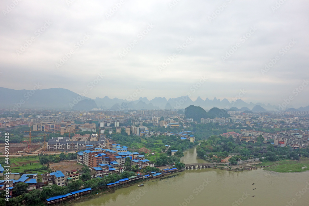 Guilin : Beautiful cityscape along the Lijiang river of Guilin city, Guangxi province, China in morning mist. Bird eye view of Guilin city.