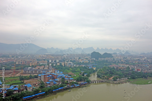 Guilin : Beautiful cityscape along the Lijiang river of Guilin city, Guangxi province, China in morning mist. Bird eye view of Guilin city.