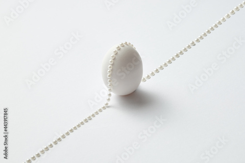 White Easter egg and pearls photo