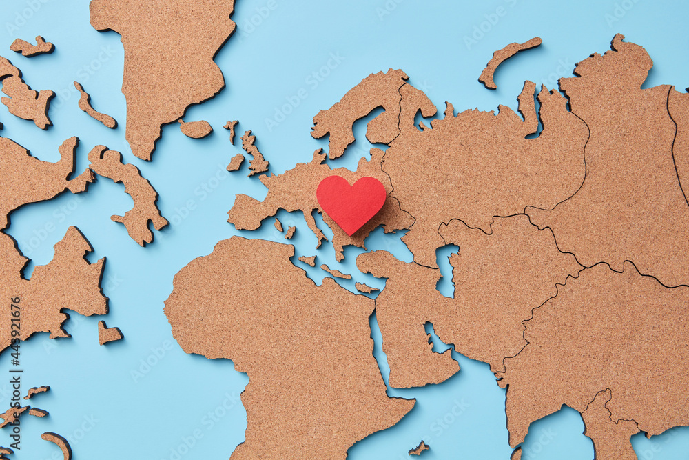 © Yaroslav Danylchenko/Stocksy - One red heart on Europe map © Yaroslav Danylchenko/Stocksy - One red heart on Europe map