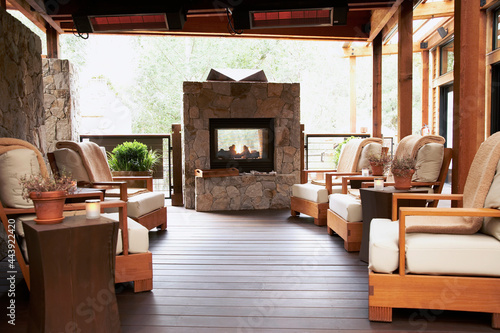 Outdoor fireplace and lounge at a hotel photo