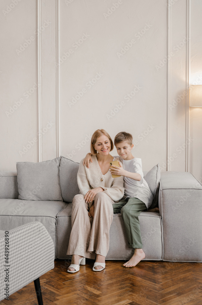 Mother and child taking selfie at home Mother and child taking selfie at home