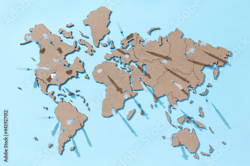 World map with syringes