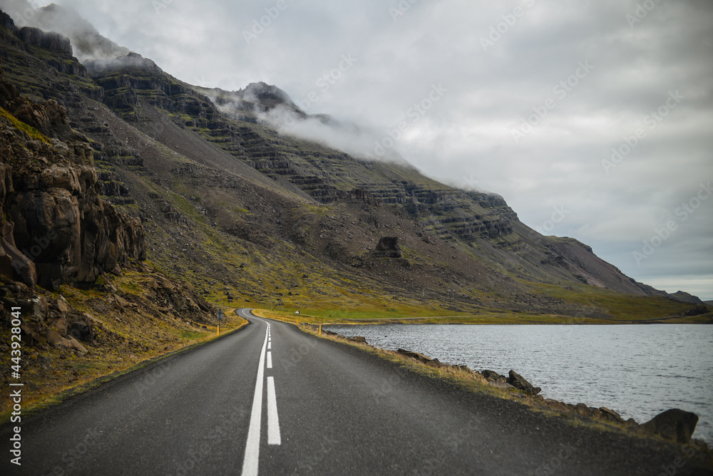 The Ring Road by the side of a fjord approaching Djupivogur village, East Fjords, Iceland