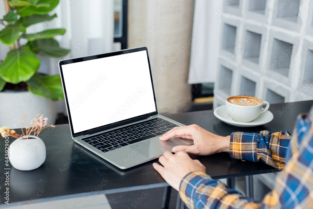 computer screen blank mockup.hand woman work using laptop with white background for advertising,contact business search information on desk at coffee shop.marketing and creative design computer screen blank mockup.hand woman work using laptop with white background for advertising,contact business search information on desk at coffee shop.marketing and creative design