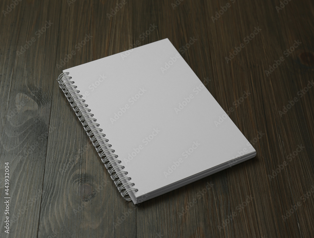 Blank paper brochure on wooden table. Mockup for design Blank paper brochure on wooden table. Mockup for design