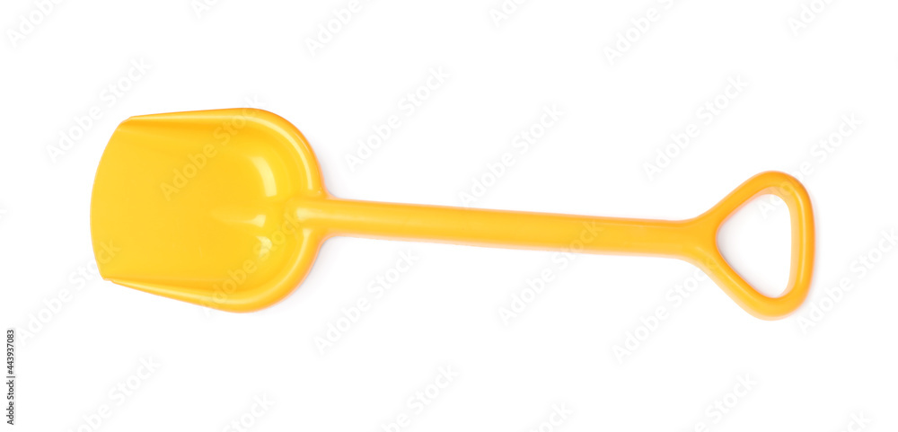 Yellow plastic toy shovel isolated on white, top view Yellow plastic toy shovel isolated on white, top view