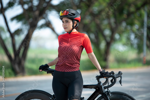 Portrait caucusian woman posing on her bicycle