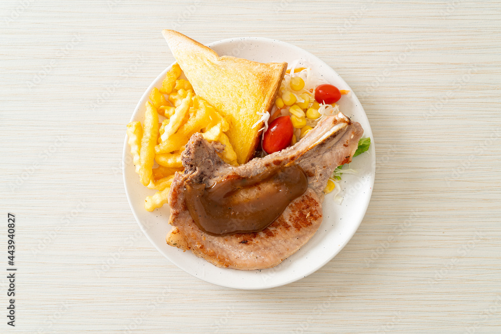 pork chop steak with chips and mini salad pork chop steak with chips and mini salad