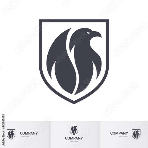 Creative Eagle Logo Inside Shield. Concept Inspiration Template. Modern Professional Hawk Logo Design. Phenix Head Logo Illustration on White Backdrop