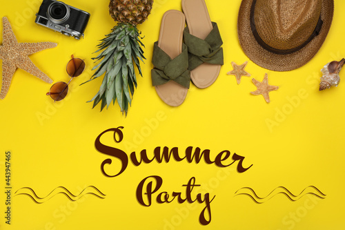 Summer party. Flat lay composition with different beach accessories on yellow background