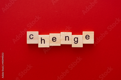 word CHANDE made of wooden letters on red background with copy space photo