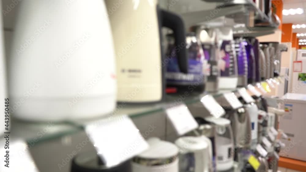 New Electric Kettles in the Store. Close-up. Nobody. Blurred Video. JIB New Electric Kettles in the Store. Close-up. Nobody. Blurred Video. JIB