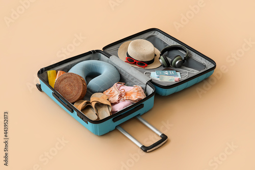 Suitcase with belongings, i...
