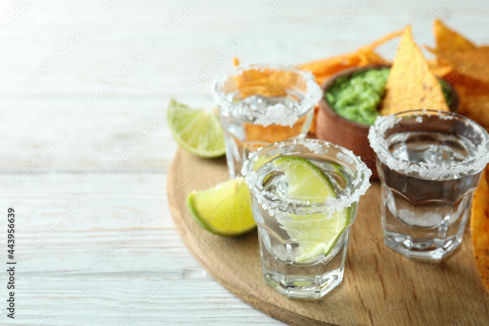 Party concept with tequila, guacamole and chips Party concept with tequila, guacamole and chips