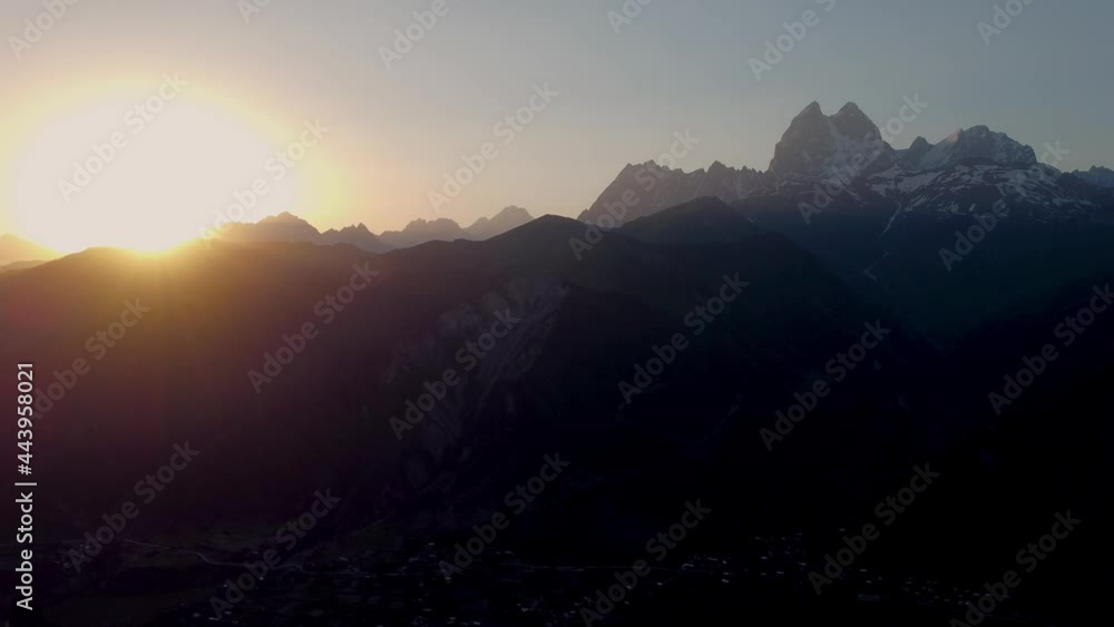 Sunset under the mountain aerial Sunset under the mountain aerial