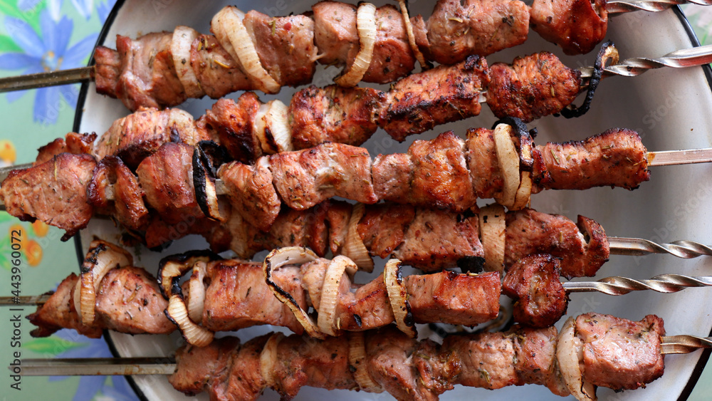 Kebabs on skewers prepared on charcoal grill, grilled meat, grilled food, shashlik