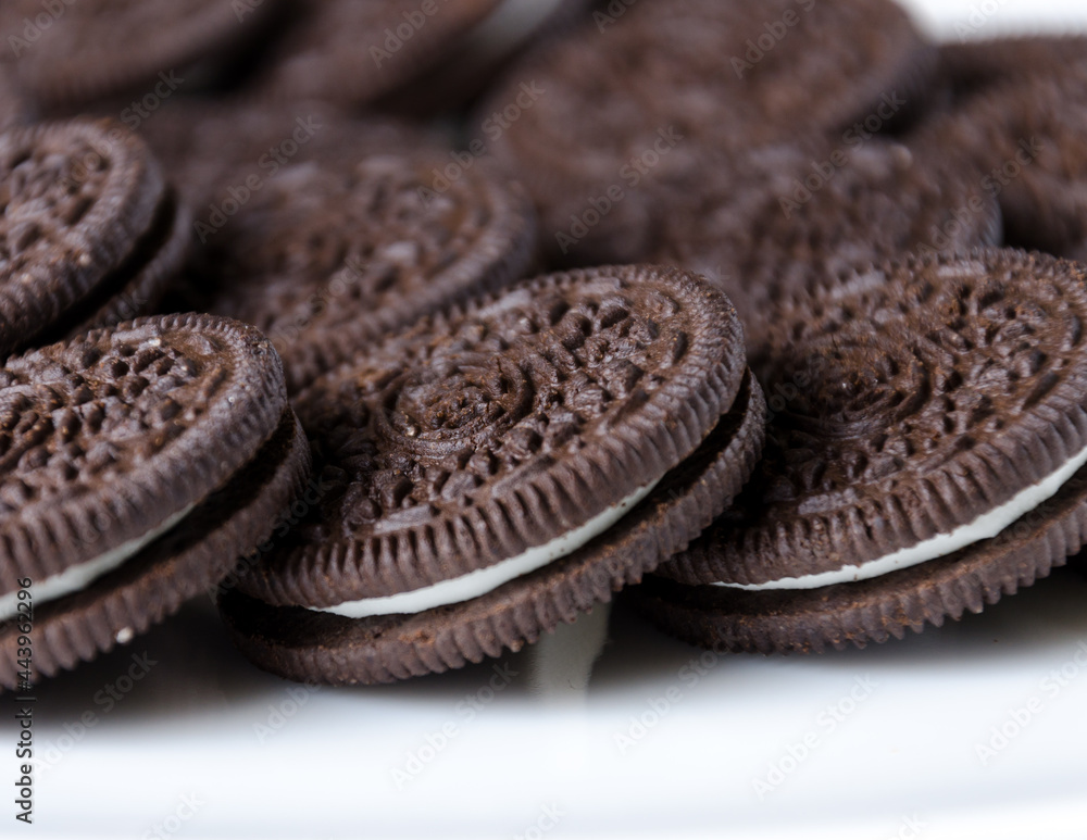 Brown cookies with white cake filling. Close-up Brown cookies with white cake filling. Close-up