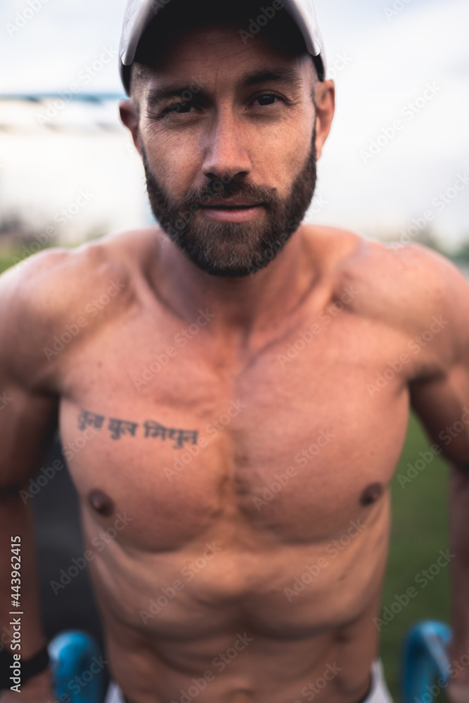 Fototapeta premium Fitness Model doing push ups - colour