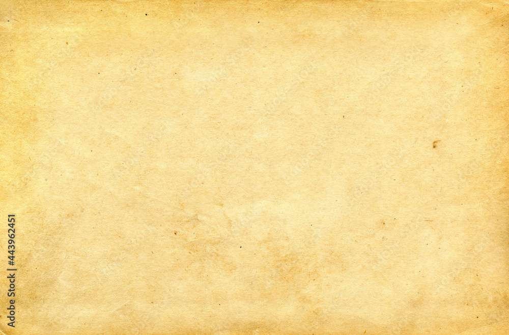 Background with texture of old vintage paper with fibers of fibers and droplets of dirt