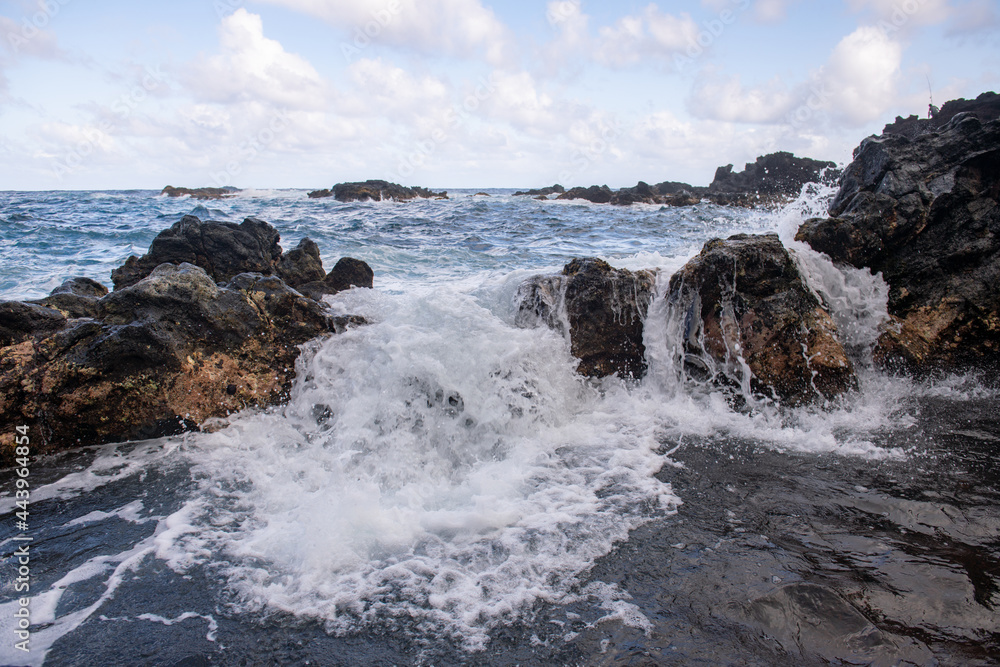 Sea with the stones and sand of a beach. Sea waves lash line impact rock. Sea with the stones and sand of a beach. Sea waves lash line impact rock.