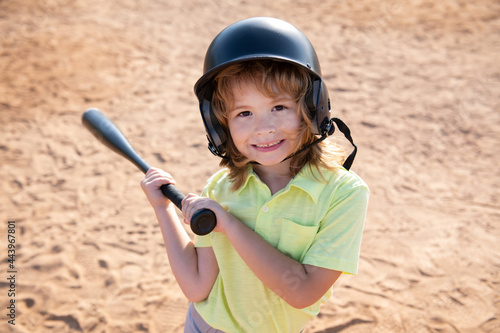 Принти на полотні Funny kid up to bat at a baseball game. Close up child portrait.
