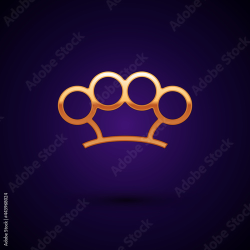 Gold Brass knuckles icon isolated on black background. Vector