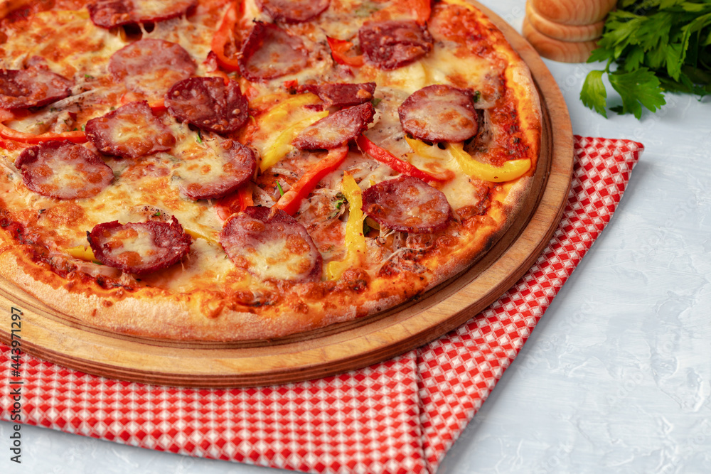 Freshly baked pizza on table close up