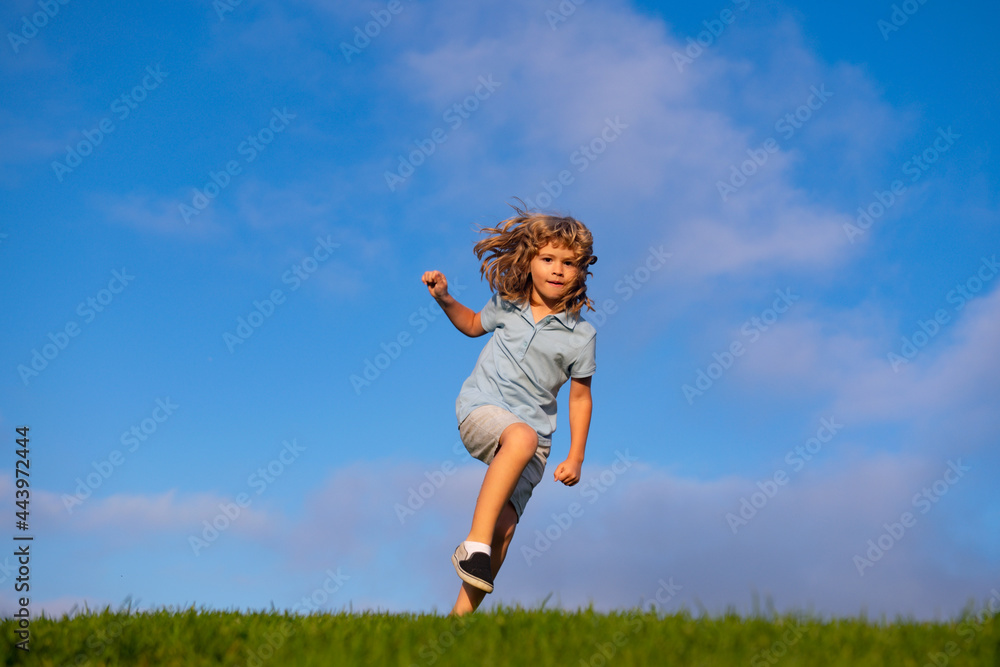 Happy child having fun outdoors. Kid playing in summer park. Little boy running on green fresh grass field. Children playing on nature. Happy child having fun outdoors. Kid playing in summer park. Little boy running on green fresh grass field. Children playing on nature.