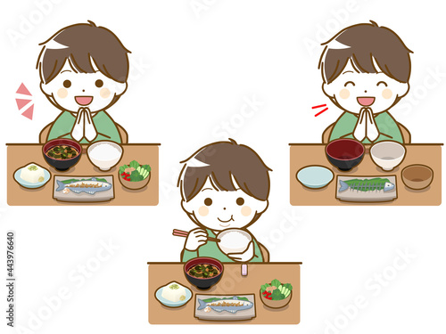 食事をしている太った幼い少年