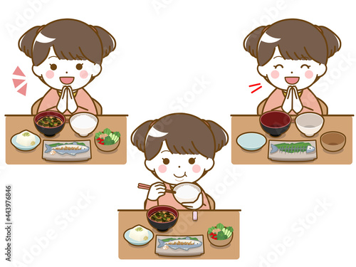 食事をしている太った幼い少女