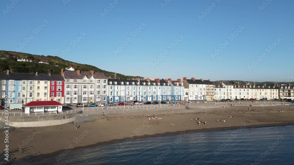 Colourful row of houses on Aberystwyth seafront Wales UK aerial footage Colourful row of houses on Aberystwyth seafront Wales UK aerial footage