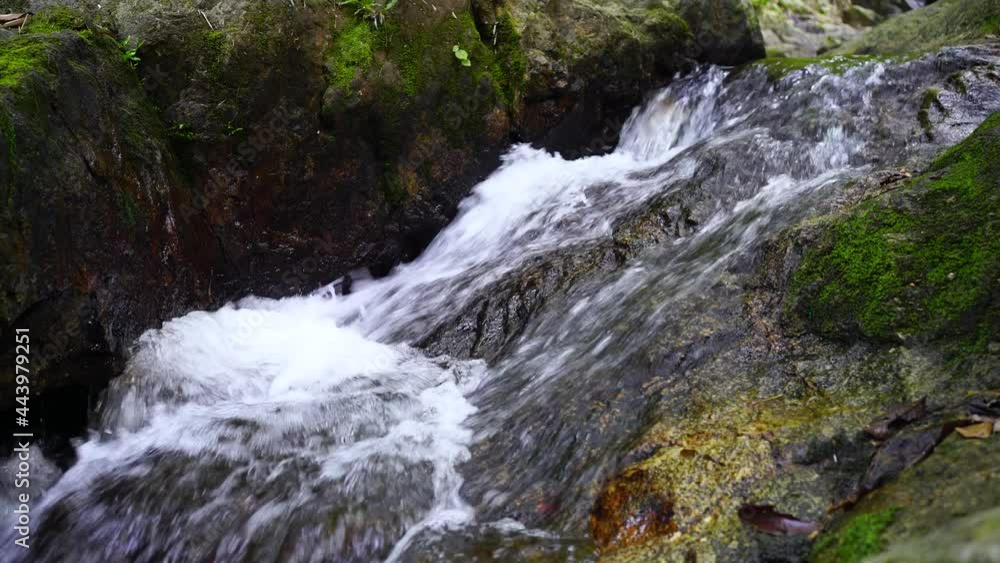 Tropical in mountain jungle. Waterfall in the tropical forest. Tropical in mountain jungle. Waterfall in the tropical forest.