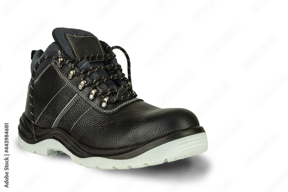 A working black leather boot with a thick gray sole on a white background. The shoes are new and clean. The laces are untied. The image is isolated. The boot is on the left and casts a shadow. A working black leather boot with a thick gray sole on a white background. The shoes are new and clean. The laces are untied. The image is isolated. The boot is on the left and casts a shadow.