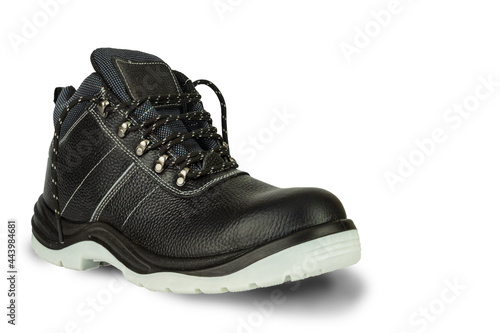 A working black leather boot with a thick gray sole on a white background. The shoes are new and clean. The laces are untied. The image is isolated. The boot is on the left and casts a shadow.