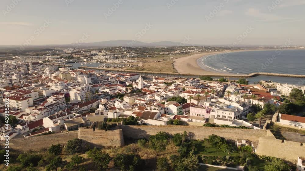 Aerial Algarve Lagos Old Town encircled by medieval City wall near coast Aerial Algarve Lagos Old Town encircled by medieval City wall near coast