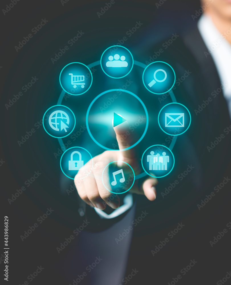 Businessman pressing simple start buttons on a virtual background. Businessman pressing simple start buttons on a virtual background.